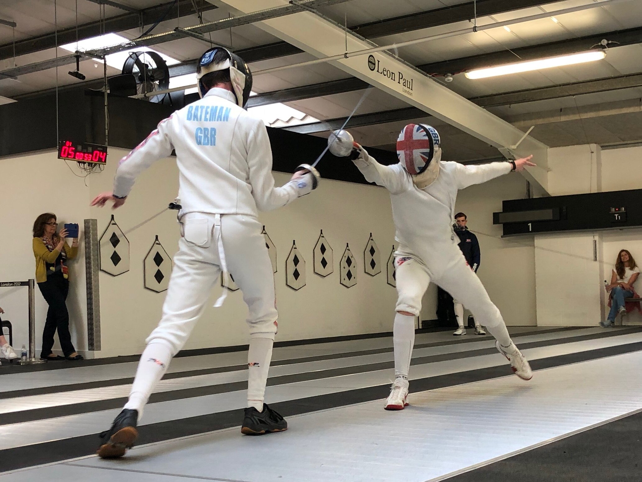 Fencing Championship: Duel Conclusion and Masterful Swordsmanship